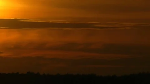 Clouds after a hurricane distort a form and change brightness of the sun. Видео 70440050