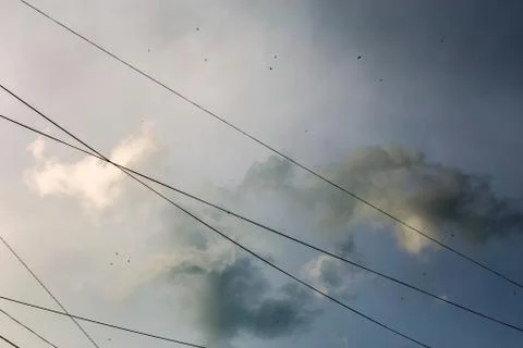 Clouds after storm with wires background Stock Photos