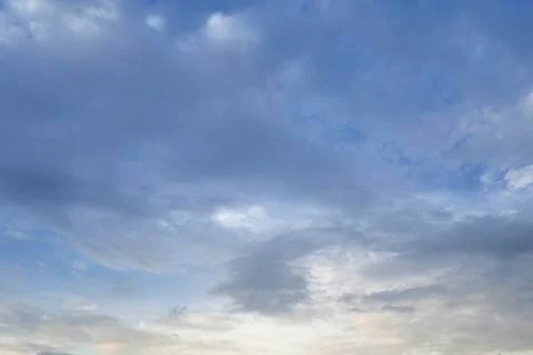 Clouds against blue sky as background Фото