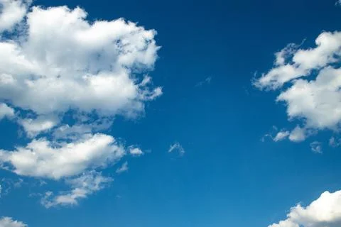 Clouds against the blue sky, close-up Stock Photos