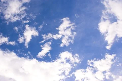 Clouds Against A Blue Sky Stock Photos