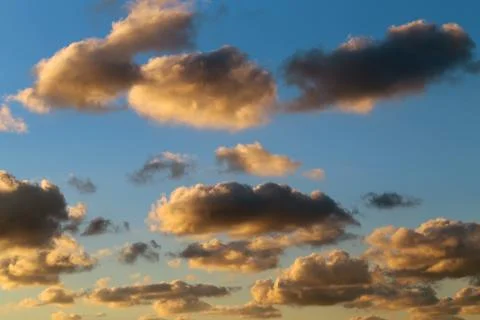Clouds against a blue sky Stock Photos