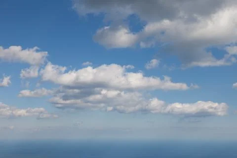 Clouds against the blue sky Stock Photos