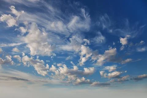 Clouds against the blue sky Stock Photos