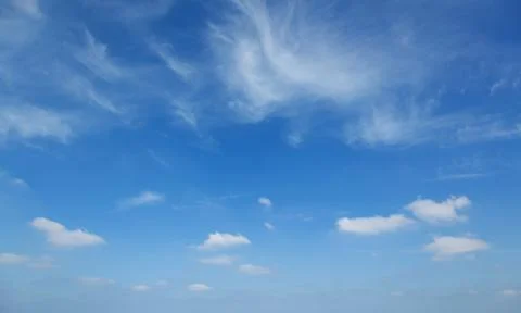 Clouds against the blue sky Stock Photos