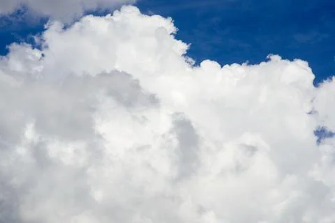 Clouds against a blue sky Stock Photos
