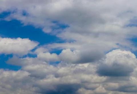 Clouds against the blue sky Stock Photos