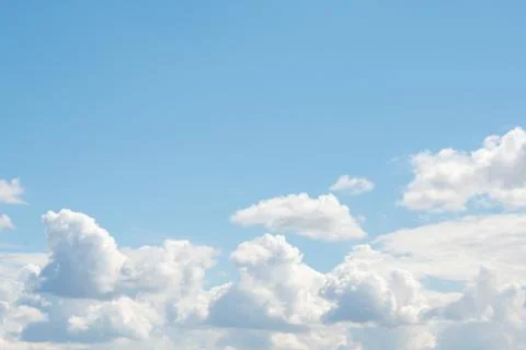 Clouds against a blue sky Stock Photos