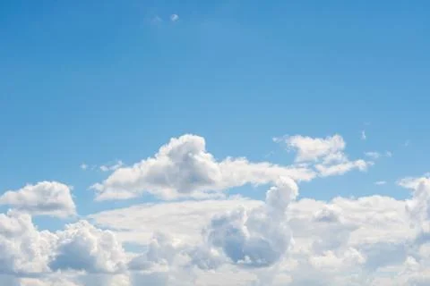 Clouds against a blue sky Stock Photos