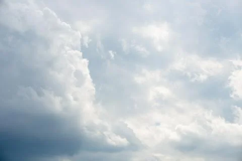 Clouds against a blue sky Stock Photos