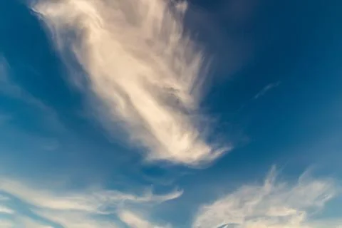 Clouds against the blue sky Stock Photos
