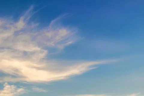 Clouds against the blue sky Stock Photos