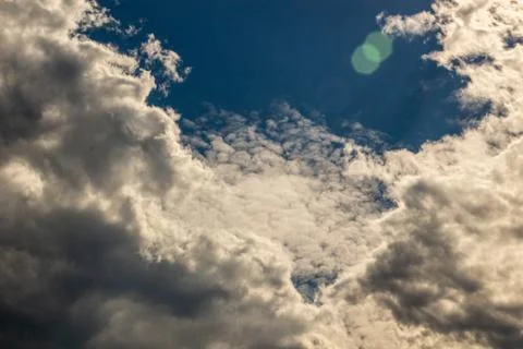 Clouds against the blue sky Stock Photos