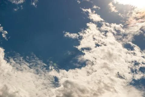 Clouds against the blue sky Stock Photos
