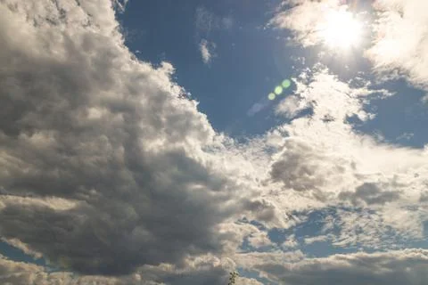 Clouds against the blue sky Stock Photos
