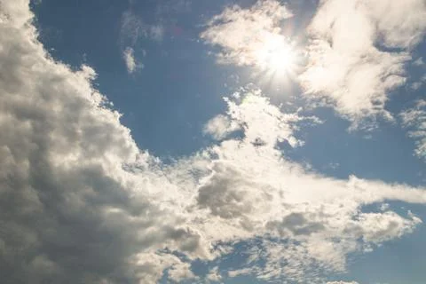 Clouds against the blue sky Stock Photos