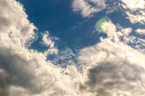 Clouds against the blue sky Stock Photos