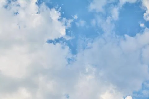 Clouds against the blue sky Stock Photos