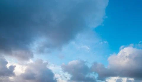 Clouds against a blue sky Stock Photos