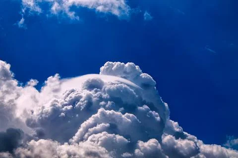 Clouds against a blue sky Stock Photos