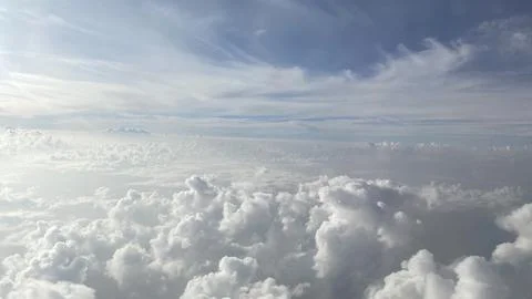 Clouds against the blue sky Stock Photos