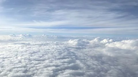 Clouds against the blue sky Stock Photos