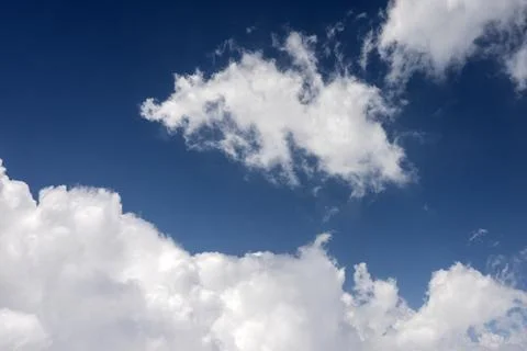 Clouds against blue sky Stock Photos