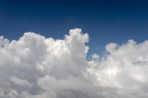 Clouds against blue sky Stock Photos
