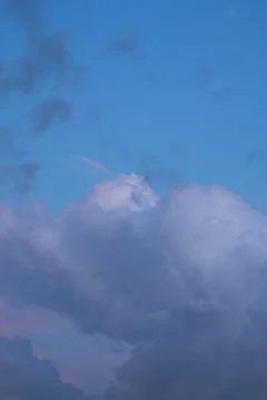 Clouds Against Blue Sky Stock Photos