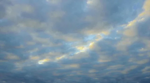 Clouds against sunrise, time lapse Stock Footage 64803451