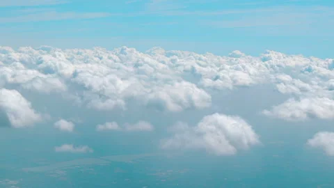 Clouds from Airplane View - Flying above clouds Stock Footage 133985506