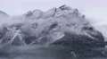 clouds along dolomite smowy summit 4k 11705 4k or 4k+ Resolution