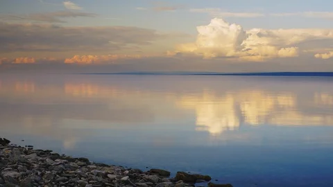 Clouds and beautiful sky timelapse over Khuvsgul lake in Mongolia Stock Footage 124997535