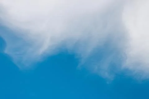 Clouds and blue sky background with copy space. Stock Photos