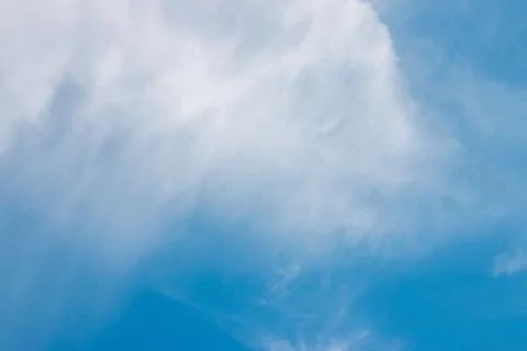 Clouds and blue sky background with copy space. Stock Photos