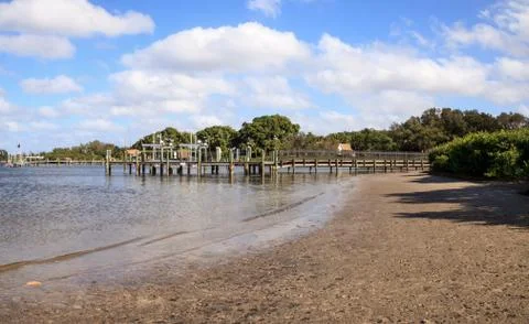 Clouds and Blue sky over Jones Bayou pier Stock Photos