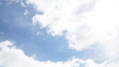 Clouds and clear blue sky Stock Photos