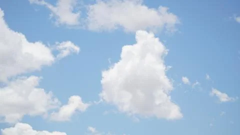 Clouds and clear blue sky Stock Photos