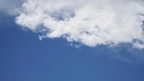Clouds and clear blue sky Stock Photos