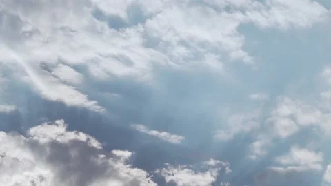 Clouds and Clear Sky during the Day, Time Lapse. The Sun Shines Through The Clou Stock Footage 136746307