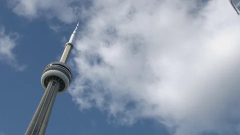 Clouds and the CN tower up close Vídeo Stock 82245834