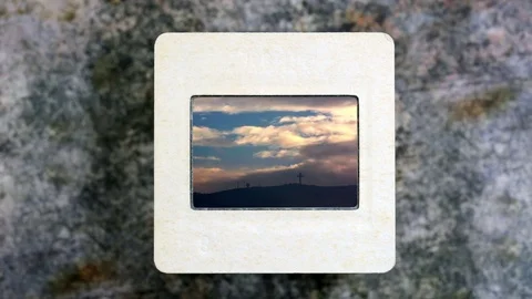 Clouds and cross on slide film Stock Footage