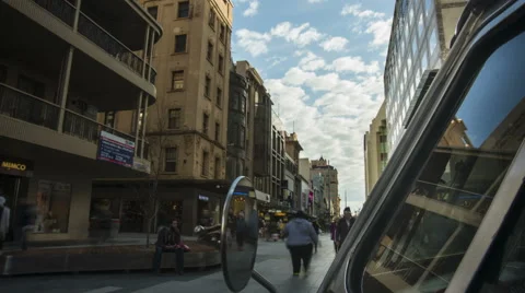 Clouds and crowds going past this combivan on Rundle Mall, Adelaide Stock Footage 52777076