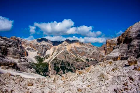 Clouds and Dolomite peaks three Stock Photos