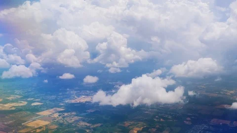 Clouds and earth passing by view from a board of flying airplane. 動画素材 110351159