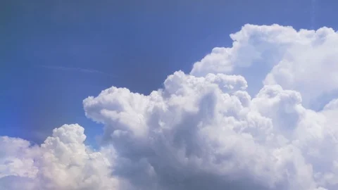 Clouds and earth passing by view from a board of flying airplane. Vídeo Stock 110351476