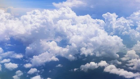 Clouds and earth passing by view from a board of flying airplane. Stock-Footage 110353003