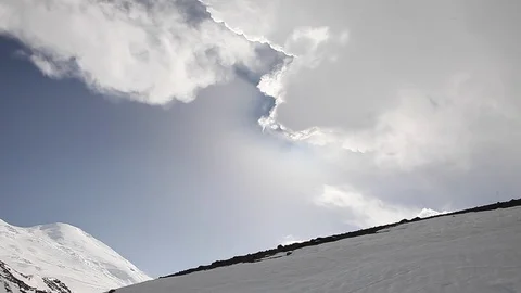 Clouds and Elbrus (caucasus mountains) Stock Footage 83774794