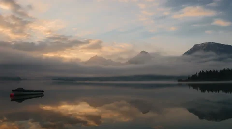 Clouds and fog  moving over the lake Video stock 63913704