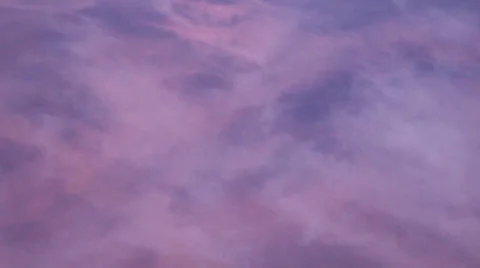 Clouds and fog seen through the window of jet airplane during sunset Видео 35052859